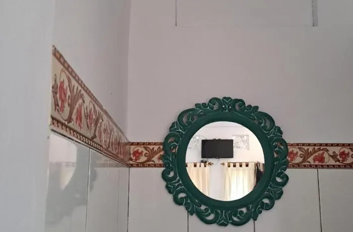 Nyoman Warta Pensión *